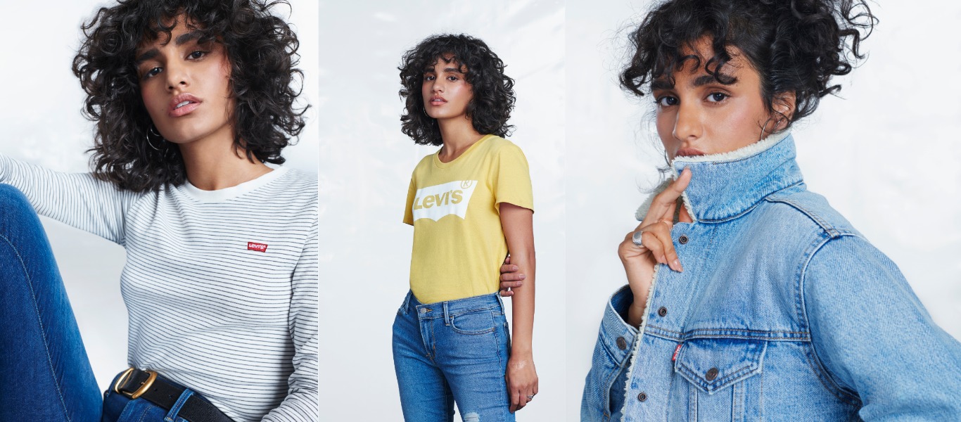 chaqueta vaquera levis, camiseta amarilla de levis y camiseta blanca de manga larga